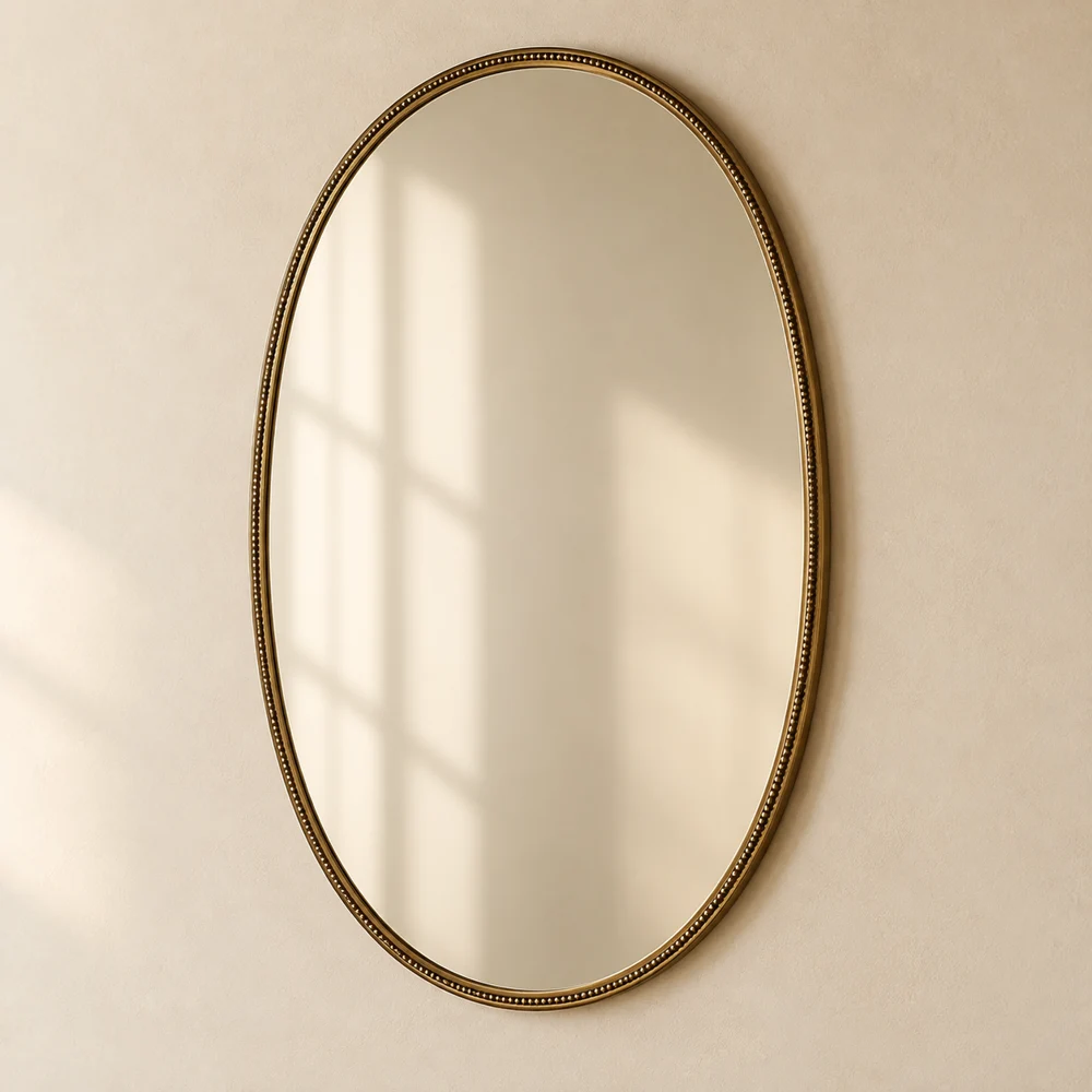 Oval Antiqued Wall Mirror — Antique Brass